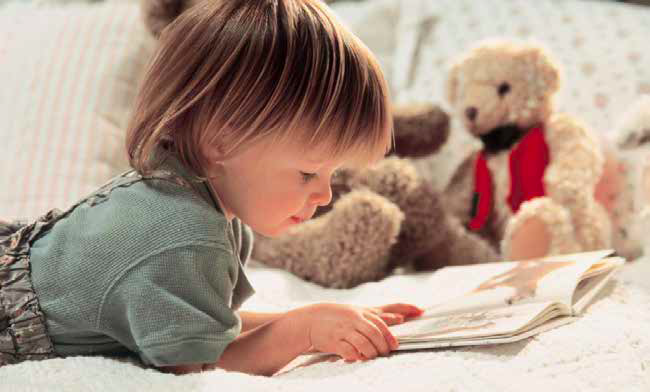 Baby reading a picture book